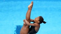 Ekspresi wajah atlet Lompat Indah putri asal Kanada Jennifer Abel saat sedang melakukan lompatan. (Foto Maddie Meyer/Getty Images)