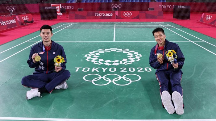 CHOFU, JAPAN - JULY 31: Gold medalists of Mens Doubles badminton event Lee Yang(right) and Wang Chi-Lin of Team Chinese Taipei pose for photo on day eight of the Tokyo 2020 Olympic Games at Musashino Forest Sport Plaza on July 31, 2021 in Chofu, Tokyo, Japan. (Photo by Lintao Zhang/Getty Images)