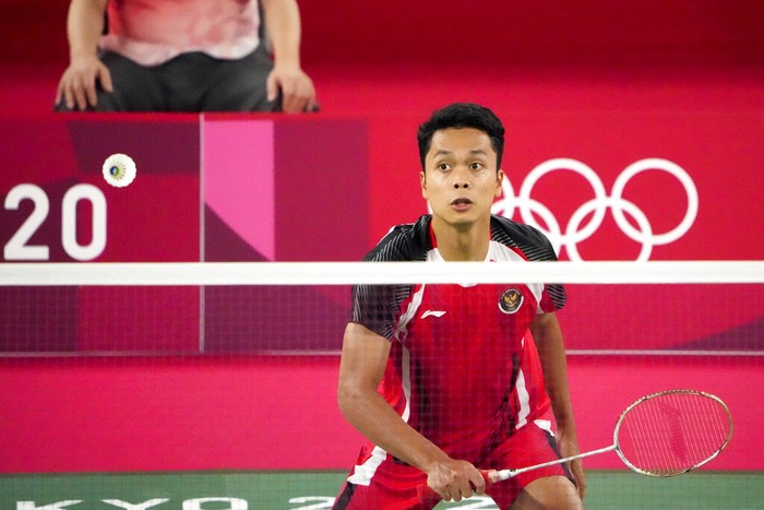 Indonesias Anthony Sinisuka Ginting competes against Chinas Chen Long during their mens singles badminton semifinal match at the 2020 Summer Olympics, Sunday, Aug. 1, 2021, in Tokyo, Japan. (AP Photo/Markus Schreiber)