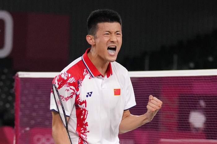 Chinas Chen Long celebrates after scoring a point against Indonesias Anthony Sinisuka Ginting during their mens singles badminton semifinal match at the 2020 Summer Olympics, Sunday, Aug. 1, 2021, in Tokyo, Japan. (AP Photo/Dita Alangkara)
