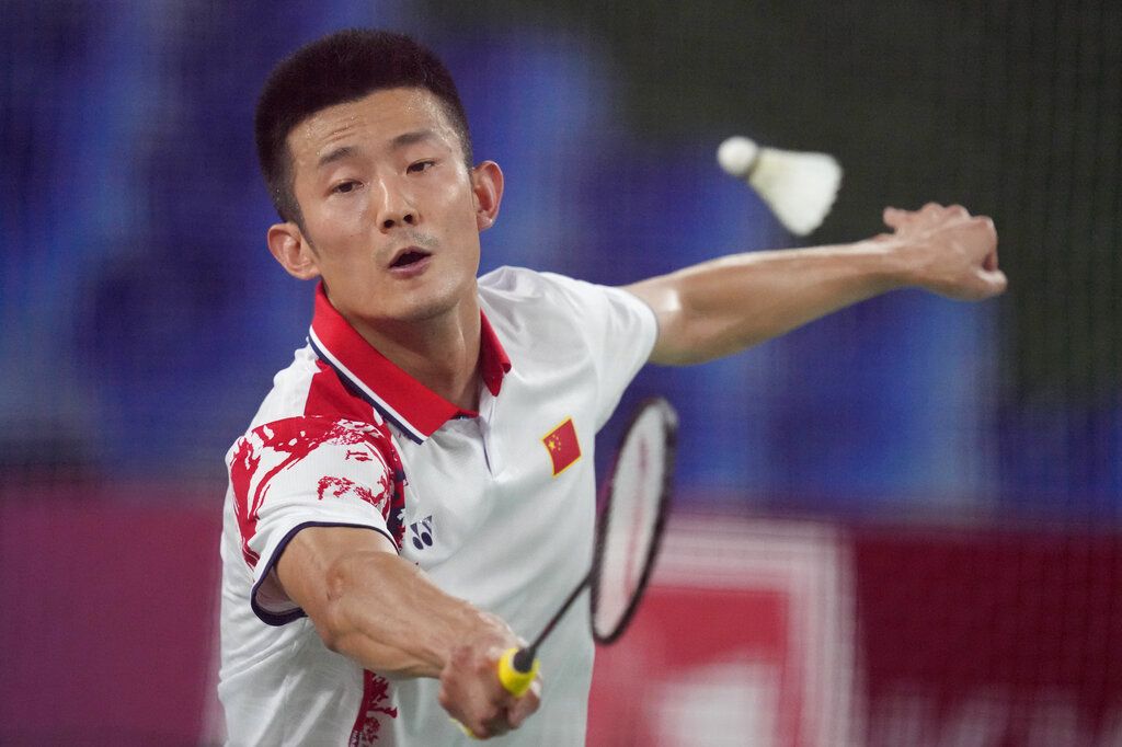 China's Chen Long celebrates after scoring a point against Indonesia's Anthony Sinisuka Ginting during their men's singles badminton semifinal match at the 2020 Summer Olympics, Sunday, Aug. 1, 2021, in Tokyo, Japan. (AP Photo/Dita Alangkara)