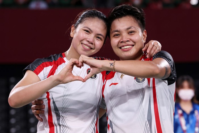CHOFU, JAPAN - AUGUST 02: Greysia Polii(left) and Apriyani Rahayu of Team Indonesia celebrate as they win against Chen Qing Chen and Jia Yi Fan of Team China during the Women’s Doubles Gold Medal match on day ten of the Tokyo 2020 Olympic Games at Musashino Forest Sport Plaza on August 02, 2021 in Chofu, Tokyo, Japan. (Photo by Lintao Zhang/Getty Images)