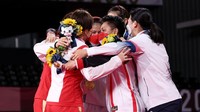 Mereka membawa Indonesia menyamai China di pesta olahraga sejagad. Lintao Zhang/Getty Images.