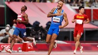 Sprinter 26 tahun kelahiran Texas ini tidak bisa menyembunyikan kegembiraannya usai menang lari 100 meter. David Ramos/Getty Images.