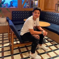 Bergaya maskulin menjadi andalan Apriyani Rahayu. Ditambah juga, gaya rambutnya yang berpotongan pendek. (Foto: Instagram)