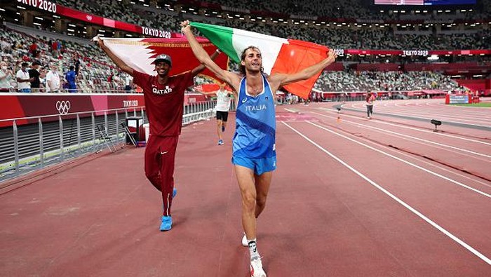 Ini Dua Atlet Lompat Tinggi yang Berbagi Emas di Olimpiade Ada kejadian tak biasa di nomor lompat tinggi putra Olimpiade Tokyo 2020. Gianmarco Tamberi (Italia) dan Mutaz Essa Barshim (Qatar) sepakat berbagi medali emas.