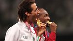 Ini Dua Atlet Lompat Tinggi yang Berbagi Emas di Olimpiade