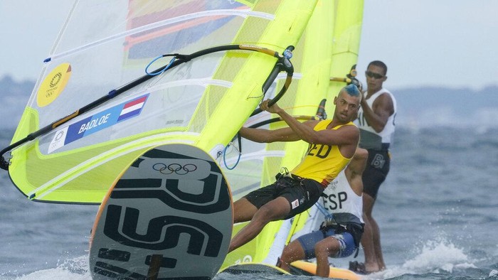 Kiran Badloe Netherlands' Kiran Badloe, foreground, competes during the men's RS:X class at the 2020 Summer Olympics, Thursday, July 29, 2021, in Fujisawa, Japan. (AP Photo/Gregorio Borgia)