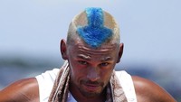 Kiran Badloe pun pamer cengiran ketika ditanya mengenai potongan rambut itu dan bilang, aku sudah tampil baik dalam lomba-lomba di Olimpiade ini, jadi mungkin saja (gaya rambut) ini membawa keberuntungan. (Foto: AP/Gregorio Borgia)