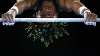 Begitu juga dengan penampilan Uche Eke, dari Nigeria, saat mengikuti kualifikasi senam artistik putra di Olimpiade Musim Tokyo 2020, Sabtu (24/7/2021) di Tokyo, Jepang. AP/Gregory Bull