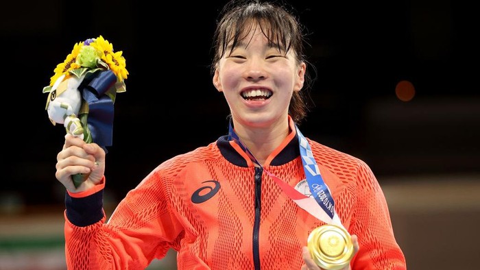 TOKYO, JAPAN - AUGUST 03: Womens Feather (52-57kg) gold medalist Sena Irie of Team Japan poses with her medal during the Victory Ceremony on day eleven of the Tokyo 2020 Olympic Games at Kokugikan Arena on August 03, 2021 in Tokyo, Japan. (Photo by Dan Mullan/Getty Images)