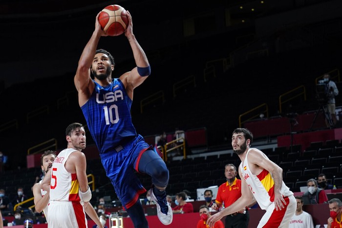 United States' Kevin Durant (7) drives to the basket over Spain's Ricky Rubio (9) during a men's basketball quarterfinal round game at the 2020 Summer Olympics, Tuesday, Aug. 3, 2021, in Saitama, Japan. (Gregory Shamus/Pool Photo via AP)