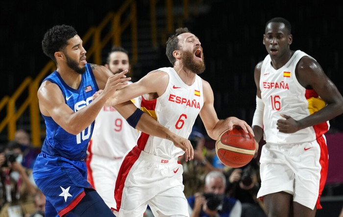 United States' Kevin Durant (7) drives to the basket over Spain's Ricky Rubio (9) during a men's basketball quarterfinal round game at the 2020 Summer Olympics, Tuesday, Aug. 3, 2021, in Saitama, Japan. (Gregory Shamus/Pool Photo via AP)