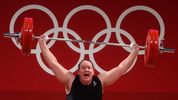Laurel Hubbard of New Zealand competes in the women's +87kg weightlifting event at the 2020 Summer Olympics, Monday, Aug. 2, 2021, in Tokyo, Japan. (AP Photo/Luca Bruno)
