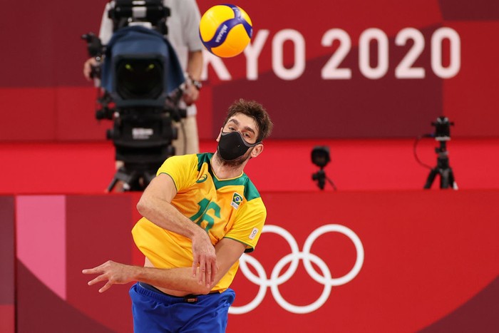 TOKYO, JAPAN - AUGUST 03: Lucas Saatkamp #16 of Team Brazil hits the ball against Team Japan during the Men's Quarterfinals volleyball on day eleven of the Tokyo 2020 Olympic Games at Ariake Arena on August 03, 2021 in Tokyo, Japan. (Photo by Toru Hanai/Getty Images)