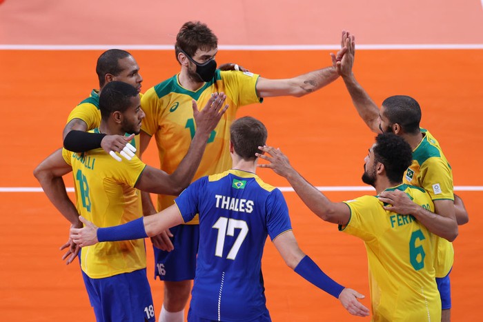 TOKYO, JAPAN - AUGUST 03: Lucas Saatkamp #16 of Team Brazil hits the ball against Team Japan during the Men's Quarterfinals volleyball on day eleven of the Tokyo 2020 Olympic Games at Ariake Arena on August 03, 2021 in Tokyo, Japan. (Photo by Toru Hanai/Getty Images)