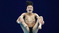 Begini ekspresi Haram Woo dari Korea Selatan saat bertanding di final loncat indah putra 3 meter di Olimpiade Tokyo. 