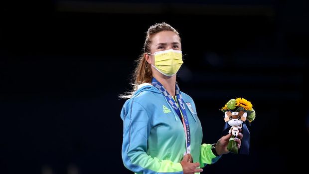 TOKYO, JAPAN - JULY 31: Bronze medalist Elina Svitolina of Team Ukraine looks on from the podium during the medal ceremony after the Women's Singles Gold Medal match on day eight of the Tokyo 2020 Olympic Games at Ariake Tennis Park on July 31, 2021 in Tokyo, Japan. (Photo by Naomi Baker/Getty Images)