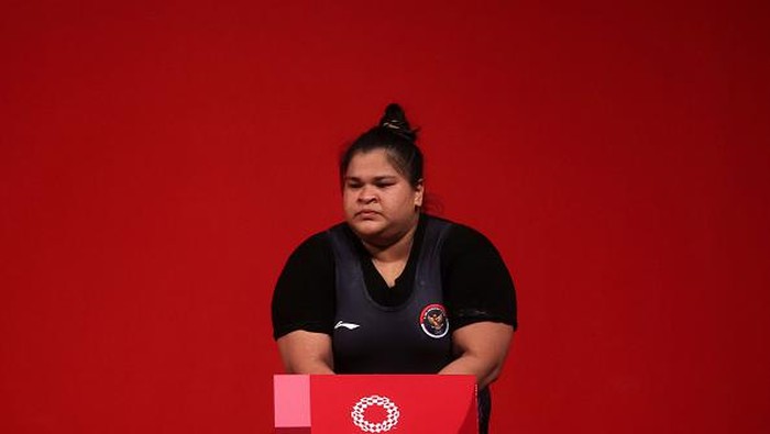 TOKYO, JAPAN - AUGUST 02: Nurul Akmal of Team Indonesia competes during the Weightlifting - Womens 87kg+ Group A on day ten of the Tokyo 2020 Olympic Games at Tokyo International Forum on August 02, 2021 in Tokyo, Japan. (Photo by Chris Graythen/Getty Images)