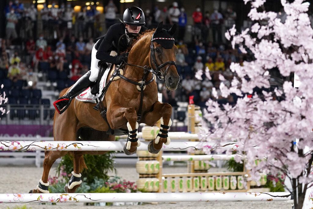 Britain's Harry Charles, riding Romeo 88, competes during the equestrian jumping individual qualifying at Equestrian Park in Tokyo at the 2020 Summer Olympics, Tuesday, Aug. 3, 2021, in Tokyo, Japan. (AP Photo/Carolyn Kaster)