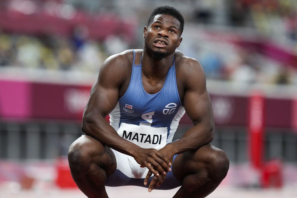 Emmanuel Matadi, of Liberia, reacts after a heat in the men's 100-meter run at the 2020 Summer Olympics, Saturday, July 31, 2021, in Tokyo. (AP Photo/Martin Meissner)