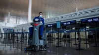 Di Wuhan, para pejabat minggu ini melakukan tes COVID-19 kepada 12 juta penduduk selama tiga hari setelah mengidentifikasi infeksi menular lokal pertama sejak pertengahan 2020, dan menutup akses sebagian wilayah. Getty Images/China Photos