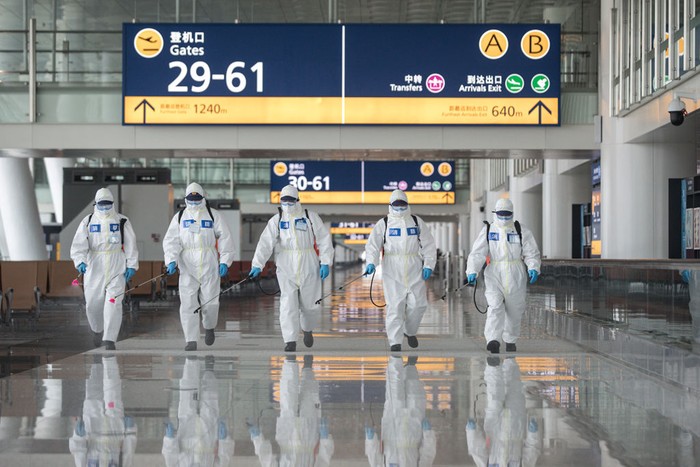 WUHAN, CHINA - APRIL 13: (CHINA OUT) A worker walks on the conveyor belt for passengers in the No. 2 Terminal Building of Wuhan Tianhe Airport on April 13, 2008 in Wuhan of Hubei Province, China. The new No. 2 Terminal Building of Tianhe Airport, which is due to open on April 15, 2008 has a annual passenger handling capacity of 13 million and a cargo handling capacity of 320,000 tons. Its 20 boarding bridges can berth 11 Boeing 737s, eight Boeing 767s and 1 A380 Airbus at the same time. (Photo by China Photos/Getty Images)