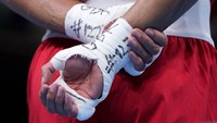 Whittaker kalah dari petinju Kuba Arlen Lopez di partai final kelas berat ringan. Padahal ia mampu mencuri perhatian kala mulus ke babak final. Frank Franklin - Pool/Getty Images  