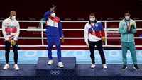 Sebelumnya medali emas pertama berhasil diraih Roniel Iglesias saat mengalahkan petinju Inggris Pat McCormack 5-0 di kelas welter pada Selasa (3/8/2021). Harry How/Getty Images