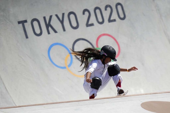 Silver medalist Kokona Hiraki of Japan poses during the medals ceremony for the women's park skateboarding finals at the 2020 Summer Olympics, Wednesday, Aug. 4, 2021, in Tokyo, Japan. (AP Photo/Ben Curtis)