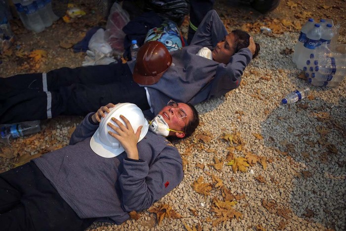 Turkey Wildfires Turkish volunteers rest as they fight wildfires in Turgut village, near tourist resort of Marmaris, Mugla, Turkey, Wednesday, Aug. 4, 2021. As Turkish fire crews pressed ahead Tuesday with their weeklong battle against blazes tearing through forests and villages on the country's southern coast, President Recep Tayyip Erdogan's government faced increased criticism over its apparent poor response and inadequate preparedness for large-scale wildfires.(AP Photo/Emre Tazegul)