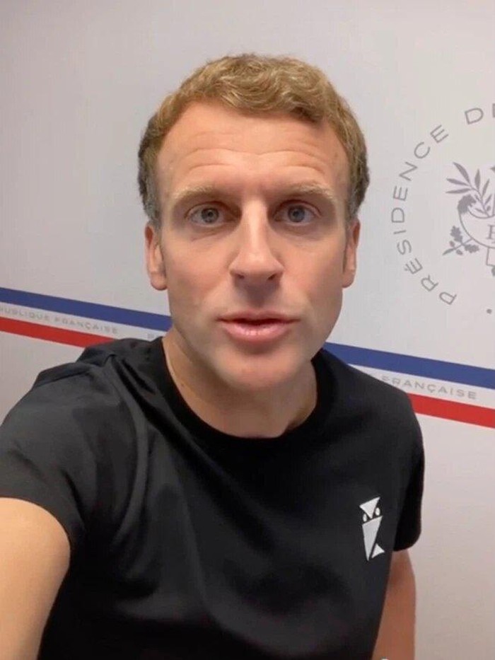 The French President wore a black T-shirt for his TikTok chat, sparking wild theories around its origin (AP via thesun.co.uk)