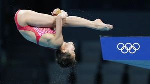 Loncatan Indah Atlet 14 Tahun Ini Sukses Raih Emas Olimpiade