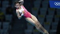 Nilai sempurnanya lah yang membuat ia sukses meraih medali emas Olimpiade Tokyo. AP Photo/Dmitri Lovetsky  