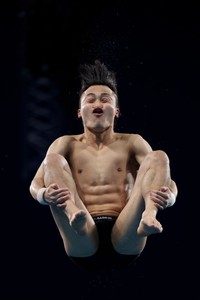 TOKYO, JAPAN - AUGUST 06: Haram Woo of Team South Korea competes in the Mens 10m Platform preliminaries on day fourteen of the Tokyo 2020 Olympic Games at Tokyo Aquatics Centre on August 06, 2021 in Tokyo, Japan. (Photo by Tom Pennington/Getty Images)