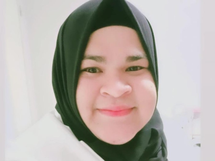 Foto Nurul Akmal, atlet angkat besi. Foto Nurul Akmal, atlet angkat besi.