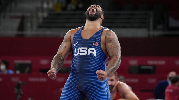 United State's Gable Dan Steveson celebrates after defeating Georgia's Gennadij Cudinovic during their men's freestyle 125kg wrestling final match at the 2020 Summer Olympics, Friday, Aug. 6, 2021, in Chiba, Japan. (AP Photo/Aaron Favila)