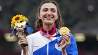 Komite Olimpiade Rusia (ROC) di posisi lima dengan 20 emas 28 perak dan 23 perunggu. AP Photo/Martin Meissner. 