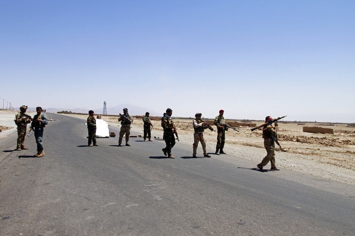 Afghanistan Afghans flees fighting between Taliban and Afghan security forces, on the outskirts of Herat, 640 kilometers (397 miles) west of Kabul, Afghanistan, Sunday, Aug. 8, 2021. (AP Photo/Hamed Sarfarazi)