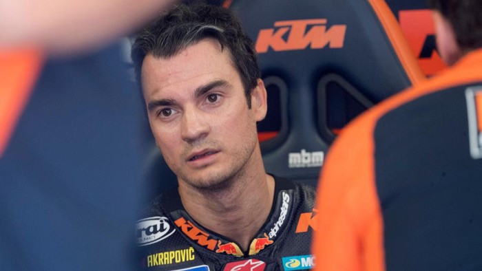 SPIELBERG, AUSTRIA - AUGUST 07: Dani Pedrosa of Spain and Red Bull KTM Factory Racing looks on in box during the MotoGP of Styria - Qualifying at Red Bull Ring on August 07, 2021 in Spielberg, Austria. (Photo by Mirco Lazzari gp/Getty Images)