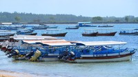 Dampak PPKM pun turut dirasakan para pengusaha yang bergerak di sektor wisata. Sebanyak 23 pengelola watersport atau permainan air di wilayah Desa Adat Tanjung Benoa mengalami kerugian masing-masing sekitar Rp60 juta per bulan karena sepinya kunjungan wisata selama masa pandemi COVID-19 serta penutupan operasional sementara kawasan wisata saat penerapan PPKM. ANTARA FOTO/Fikri Yusuf.  