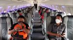 Potret Vaksin di Pesawat ala Kuningan