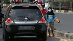 Anak Jalanan Mengais Rejeki di Jalanan
