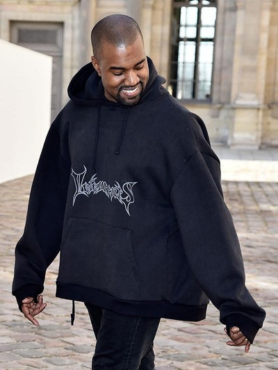 465371782 PARIS, FRANCE - MARCH 06: Kanye West attends the Christian Dior show as part of the Paris Fashion Week Womenswear Fall/Winter 2015/2016 on March 6, 2015 in Paris, France. (Photo by Pascal Le Segretain/Getty Images)