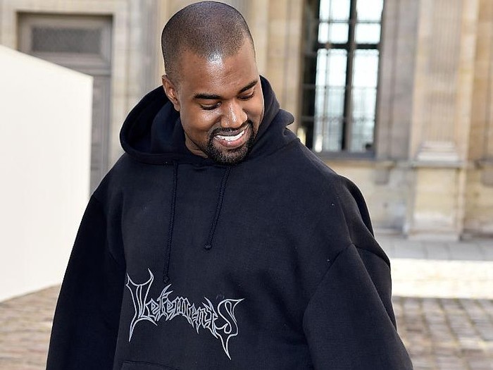 465371782 PARIS, FRANCE - MARCH 06: Kanye West attends the Christian Dior show as part of the Paris Fashion Week Womenswear Fall/Winter 2015/2016 on March 6, 2015 in Paris, France. (Photo by Pascal Le Segretain/Getty Images)