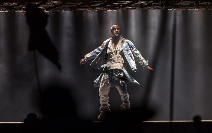 GLASTONBURY, ENGLAND - JUNE 27: Kanye West performs on The Pyramid Stage during the Glastonbury Festival at Worthy Farm, Pilton on June 27, 2015 in Glastonbury, England.  Now its 45th year the festival is one largest music festivals in the world and this year features headline acts Florence and the Machine, Kanye West and The Who. The Festival, which Michael Eavis started in 1970 when several hundred hippies paid just Â£1, now attracts more than 175,000 people.  (Photo by Ian Gavan/Getty Images)