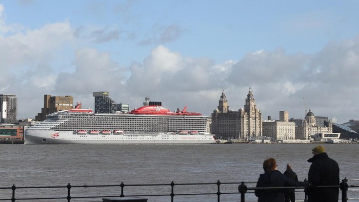 The Virgin Voyages cruise ship Scarlet Lady is seen on the River Mersey in Liverpool on February 26, 2020. - Sailing from its intended home port of Miami, Florida, Scarlet Lady is Virgin Voyages' first luxury cruise ship and is set to start operating from April 2020 on routes from Florida around the Carribean. (Photo by Paul ELLIS / AFP)