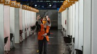 Pesta vaksinasi ini bertujuan untuk meningkatkan kekebalan imunitas yang kian menurun di Jerman. (John MACDOUGALL / POOL / AFP)