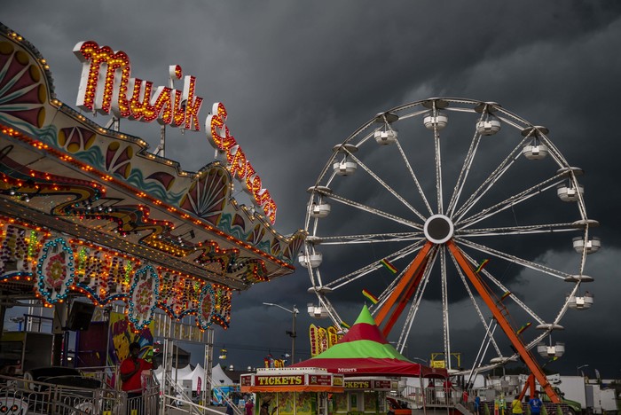 Illinois State Fair Storm Storm clouds loom over the Miller Spectacular Shows Midway at the Illinois State Fairgrounds in Springfield, Ill., Thursday, Aug. 12, 2021. (Justin L. Fowler/The State Journal-Register via AP)