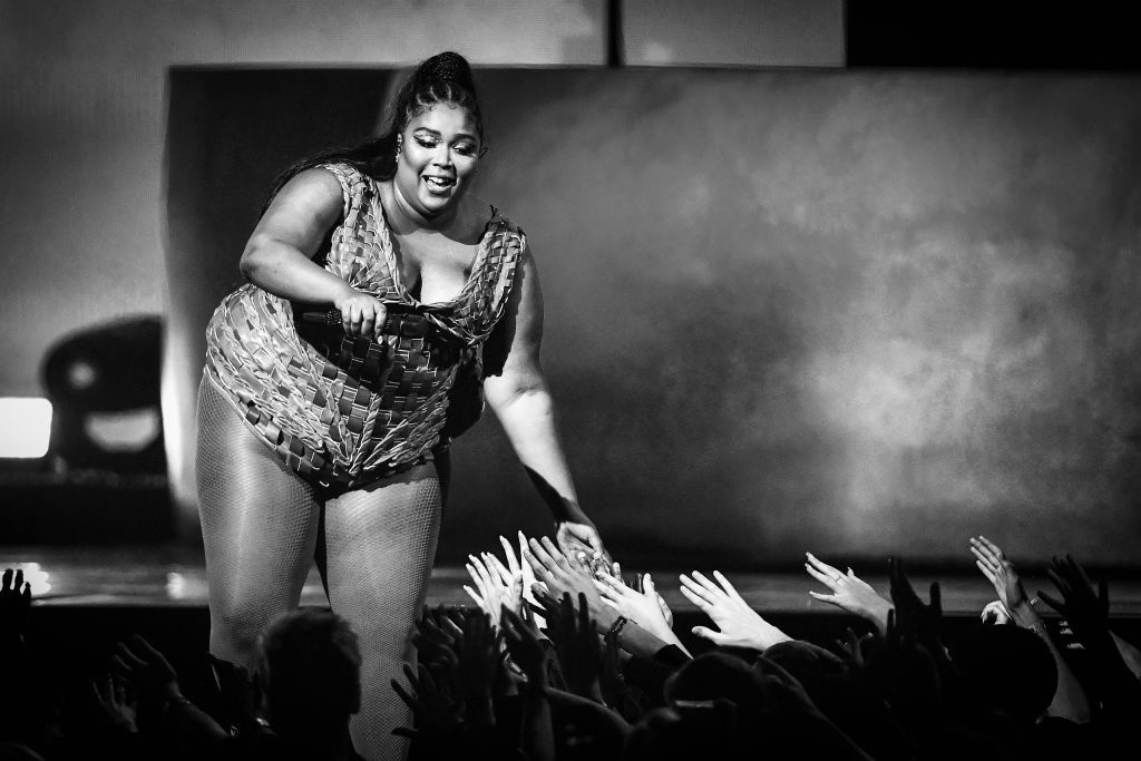 LONDON, ENGLAND - FEBRUARY 18: (EDITORIAL USE ONLY) (EDITORS NOTE: This image has been converted to black and white) Lizzo performs during The BRIT Awards 2020 at The O2 Arena on February 18, 2020 in London, England. (Photo by Gareth Cattermole/Getty Images)